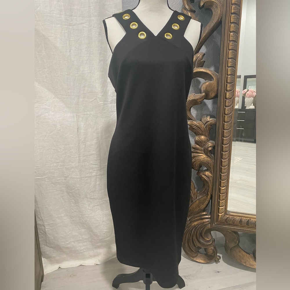 Jennifer Lopez Black Dress with Gold Ring Details